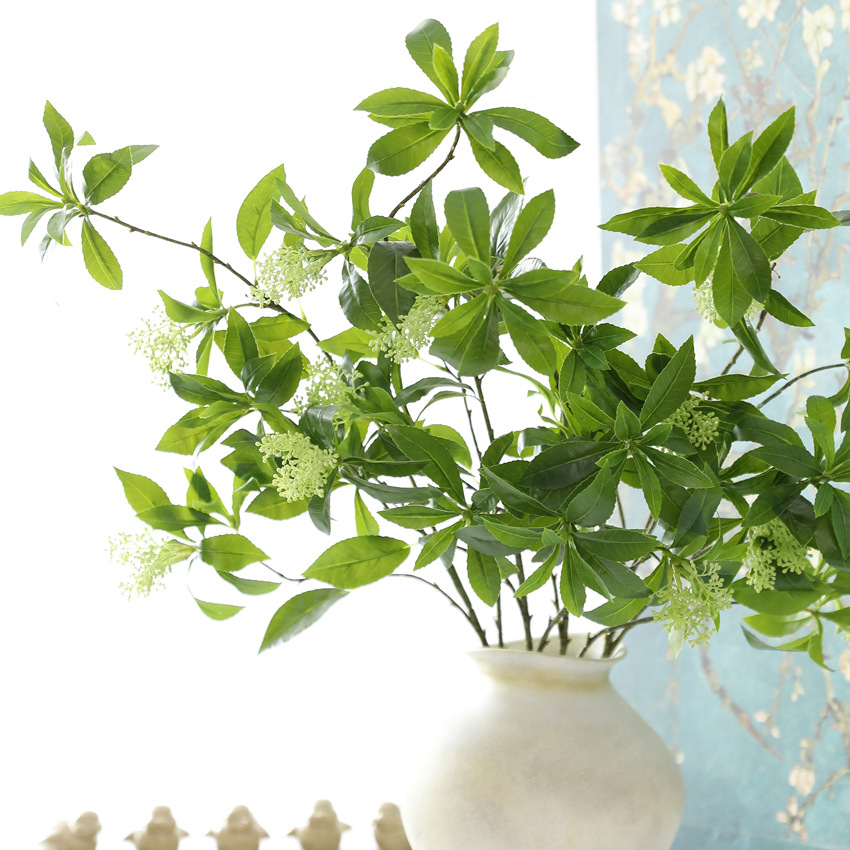 Artificial Green Plant with Faux Leaves and Hanging Clock for Home Decor